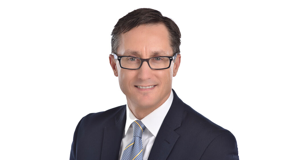 John Demming - Comcast Corporation