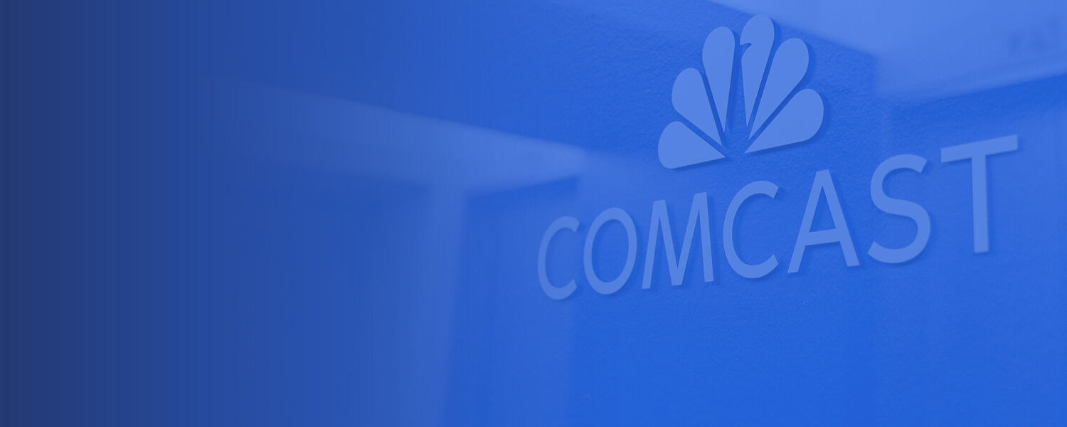 Modern building at night with glass facade