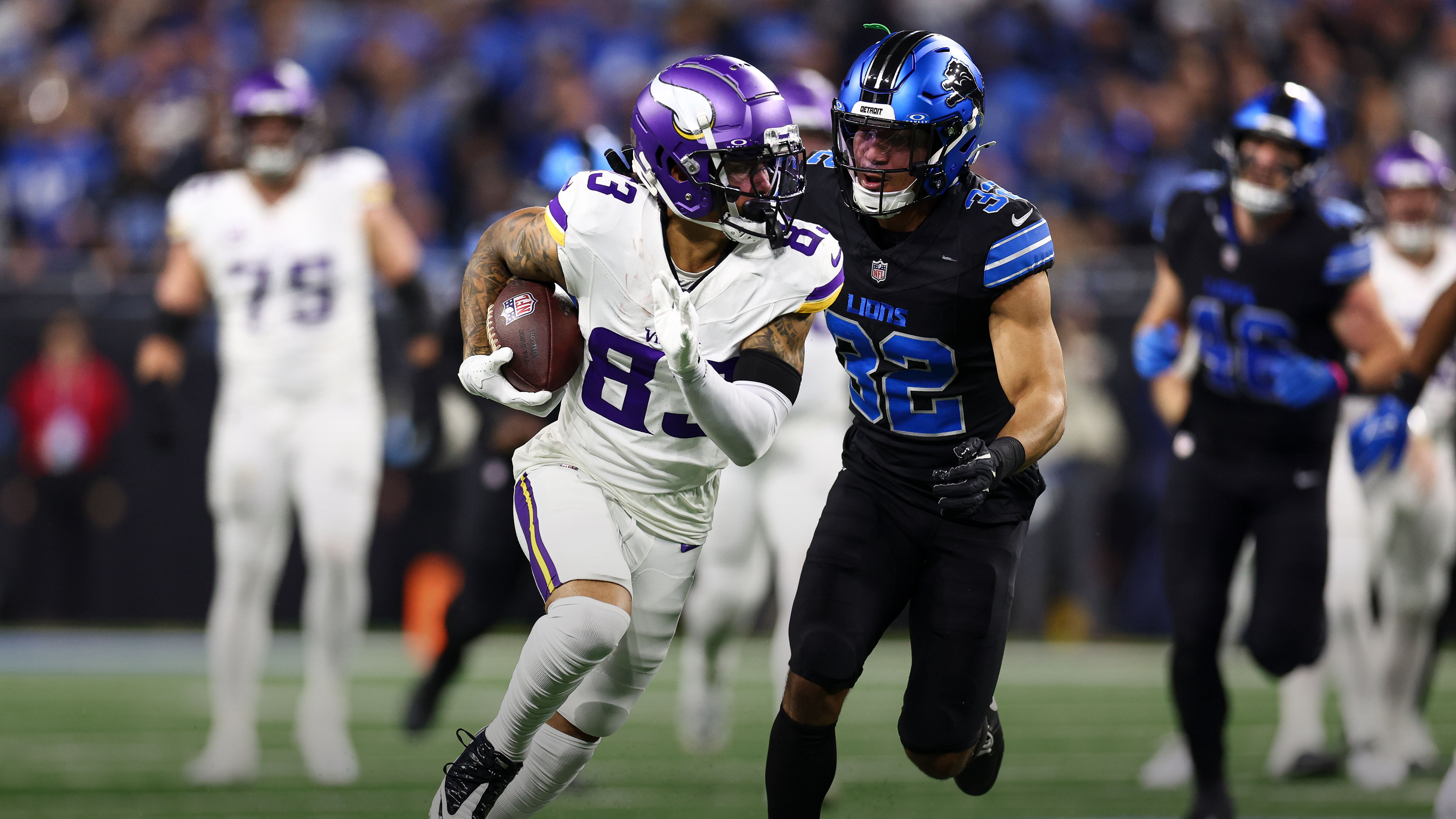 Football players on the field mid-game