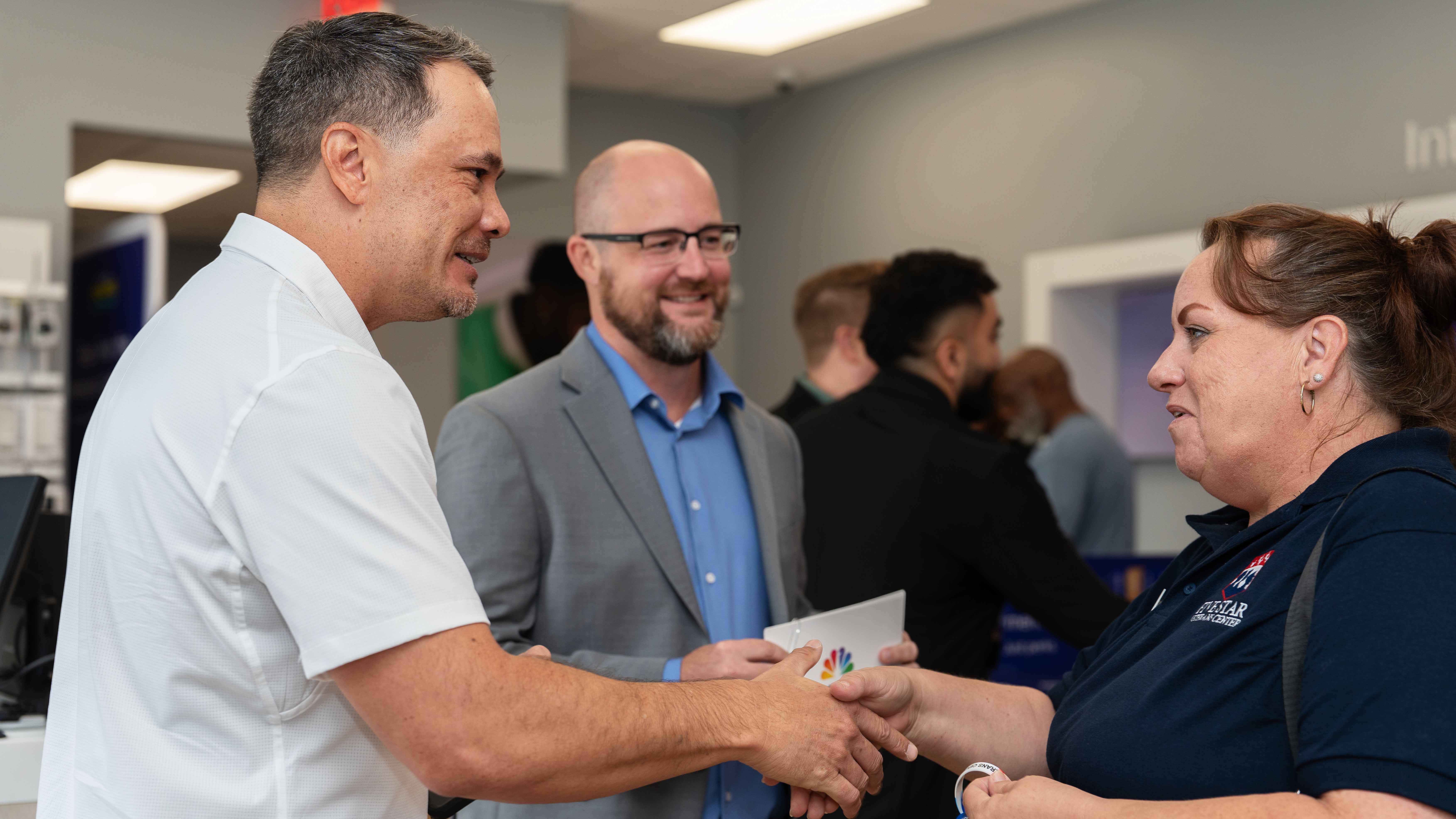 Guests connect with local leaders community partners and Xfinity team members during the grand opening event.