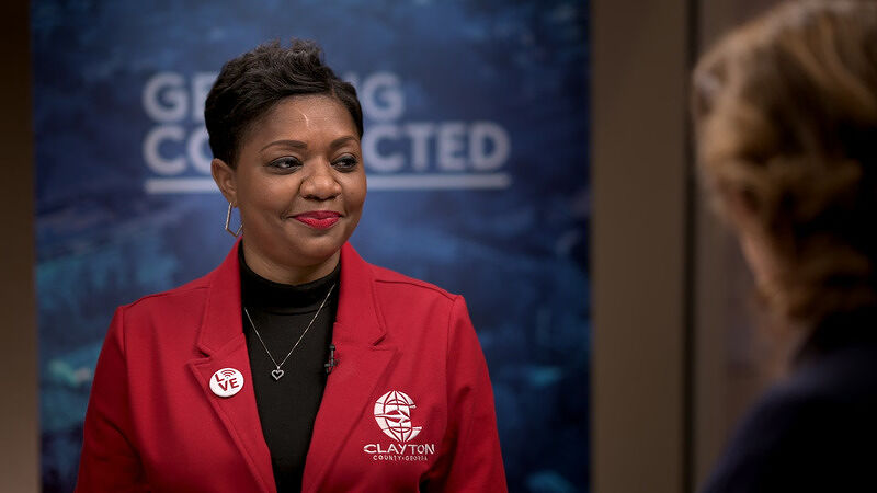 Takiyah Thomas during the interview setting with a 'Getting Connected' backdrop