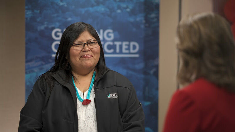 Angela Diahkah smiling during her interview